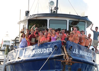 Capt. Andy Matroci with crew, family & friends on salvage vessel J.B. Magruder.
